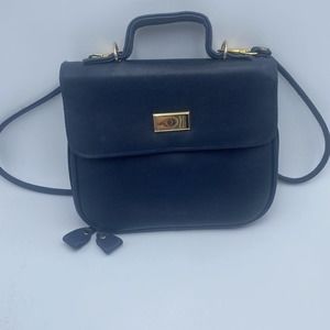 Kathy Ireland shoulder bag or hand held purse faux leather color dark blue